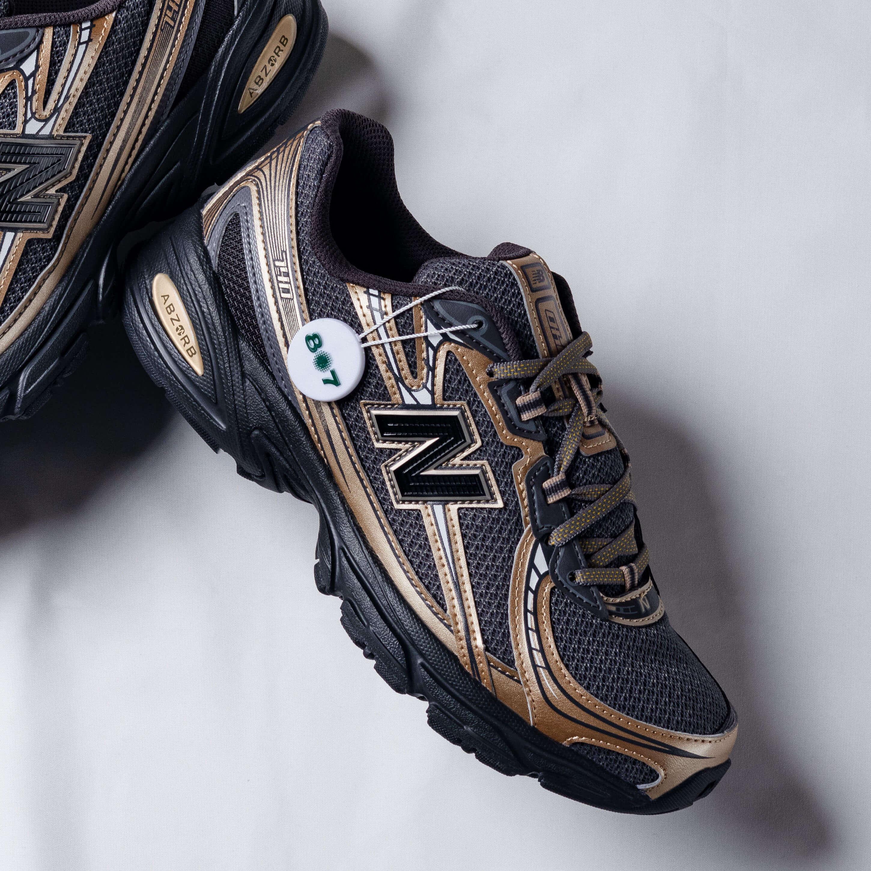 New Balance 740 V2 Black Castlerock Gold Metallic