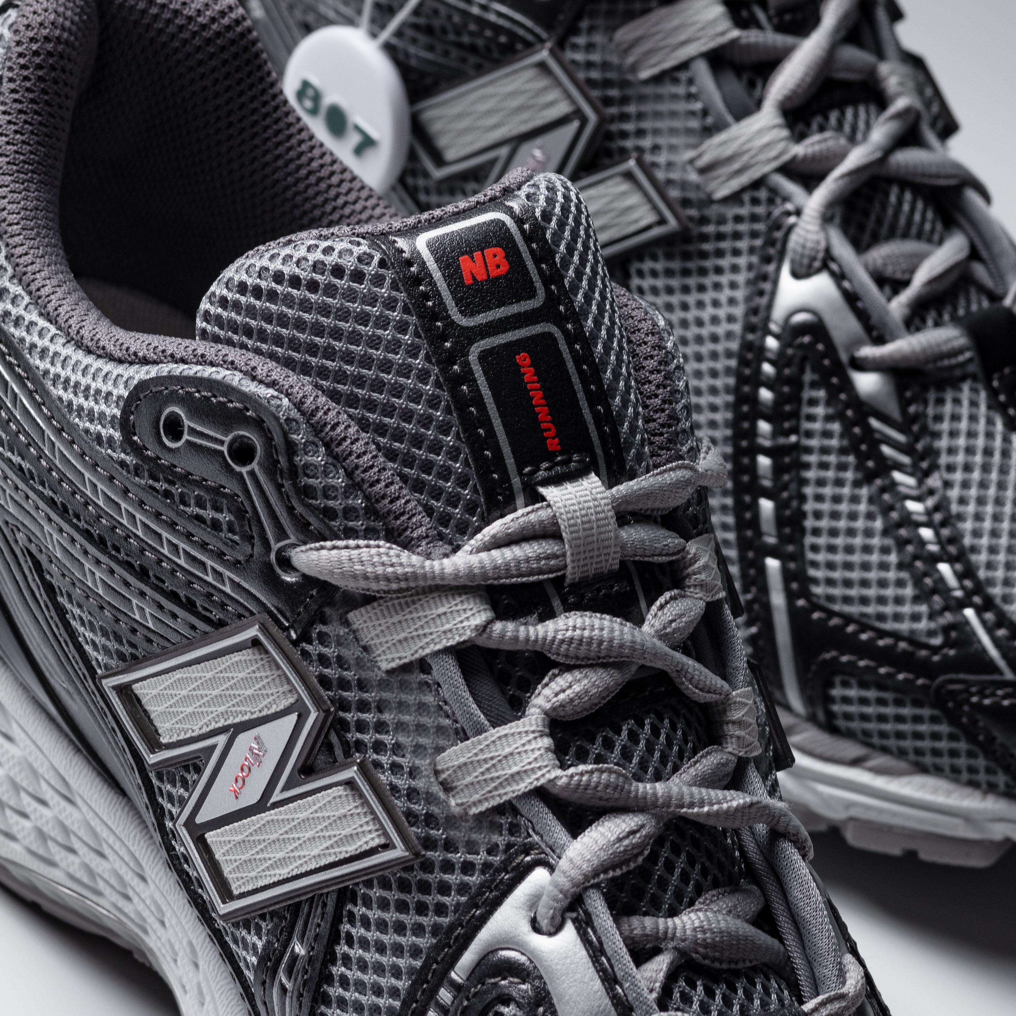 New Balance 1906R Black Metallic Urgent Red Slate